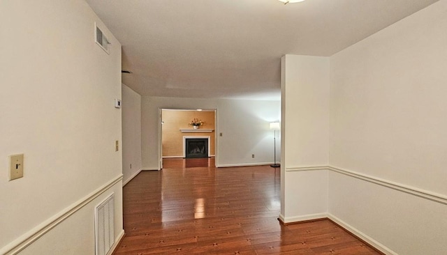 interior space with dark hardwood / wood-style flooring