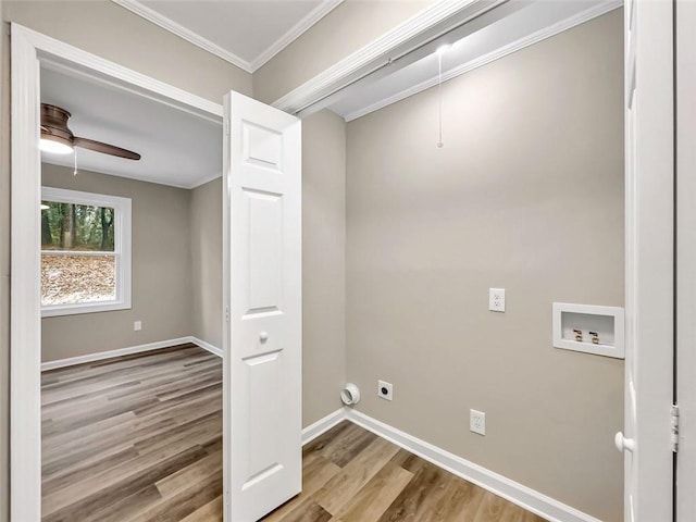 laundry room featuring light hardwood / wood-style floors, ceiling fan, electric dryer hookup, washer hookup, and ornamental molding