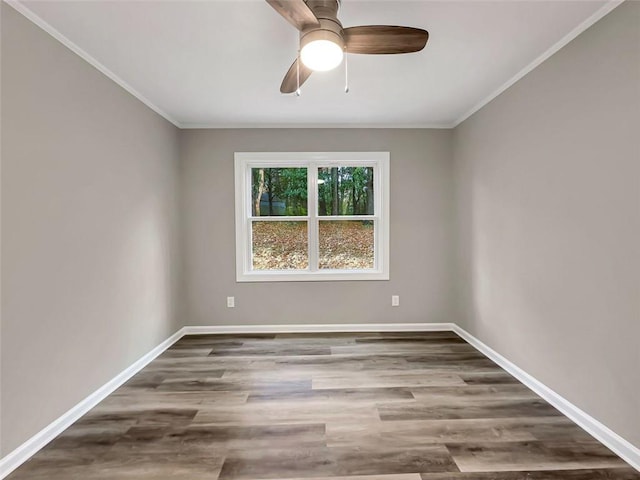 spare room featuring ceiling fan, ornamental molding, and hardwood / wood-style flooring