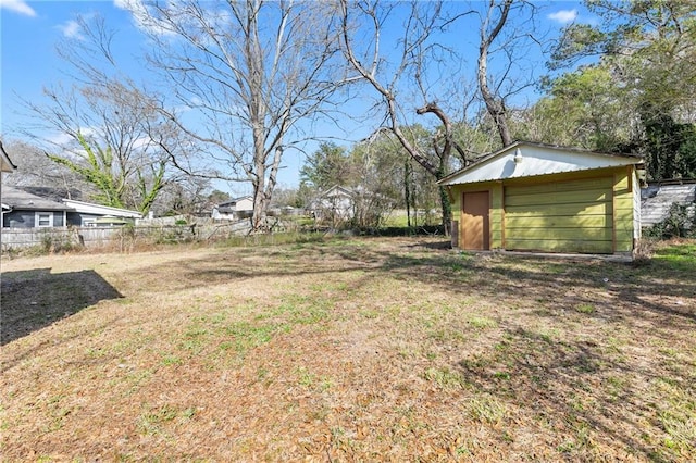 view of yard with a garage