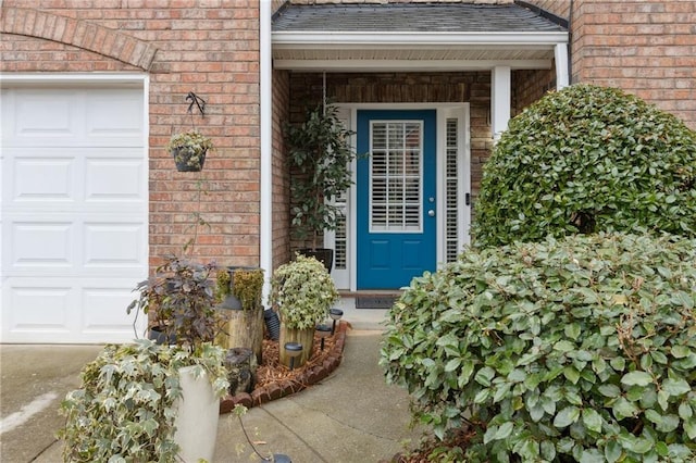 property entrance featuring a garage