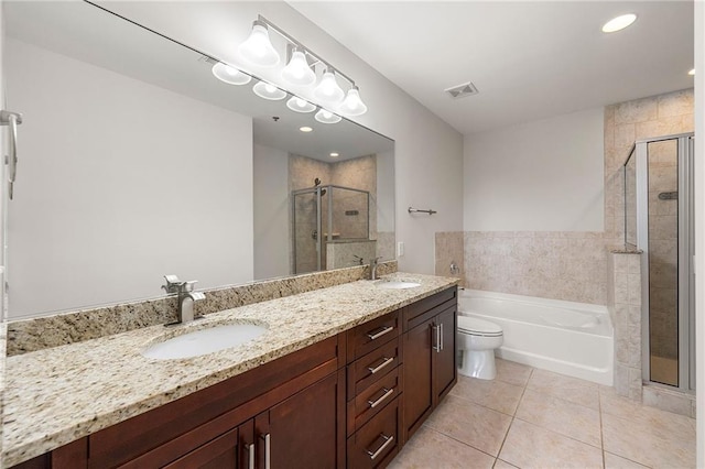 855 Peachtree St NE Unit 3205, Atlanta, GA 30308 - full bathroom with tile patterned flooring, a shower stall, double vanity, a garden tub, and toilet