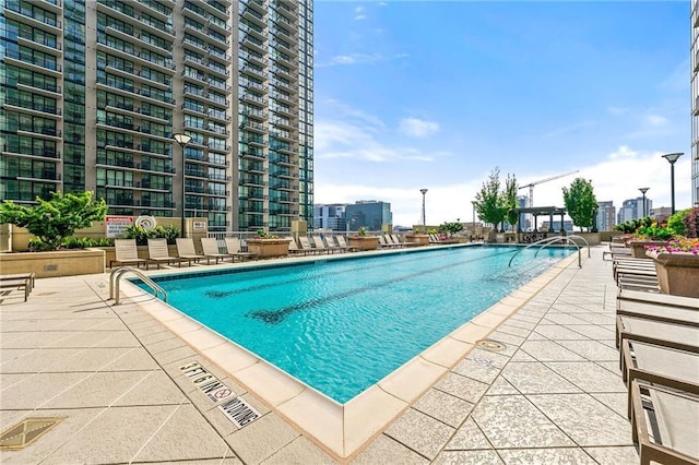 855 Peachtree St NE Unit 3205, Atlanta, GA 30308 - community pool featuring a patio