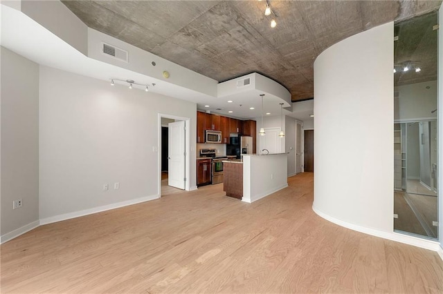 855 Peachtree St NE Unit 3205, Atlanta, GA 30308 - unfurnished living room with light wood-type flooring and baseboards