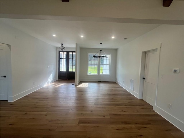 interior space featuring baseboards, visible vents, dark wood-style flooring, and recessed lighting