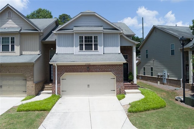 2968 Oshields Ct SW Unit 4, Marietta, GA 30060 - multi unit property featuring an attached garage, brick siding, board and batten siding, and concrete driveway