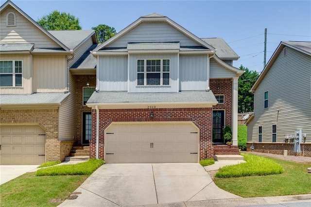 2968 Oshields Ct SW Unit 4, Marietta, GA 30060 - view of front facade featuring board and batten siding, an attached garage, brick siding, and driveway
