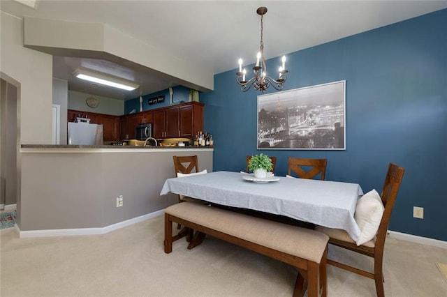 2968 Oshields Ct SW Unit 4, Marietta, GA 30060 - dining room with a chandelier and light colored carpet