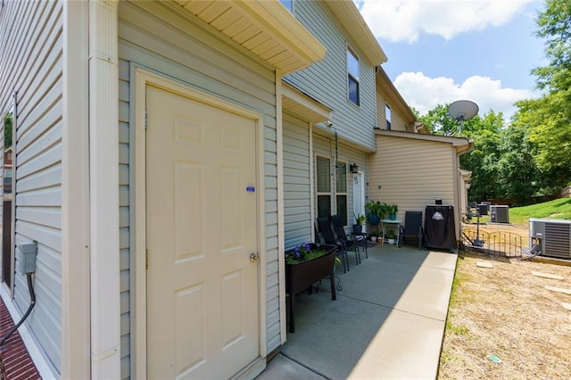 2968 Oshields Ct SW Unit 4, Marietta, GA 30060 - doorway to property with central air condition unit and a patio area