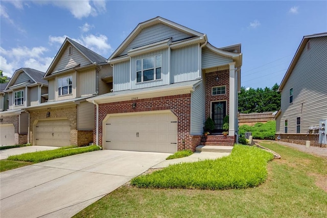 2968 Oshields Ct SW Unit 4, Marietta, GA 30060 - view of property featuring a garage, brick siding, board and batten siding, driveway, and a front yard