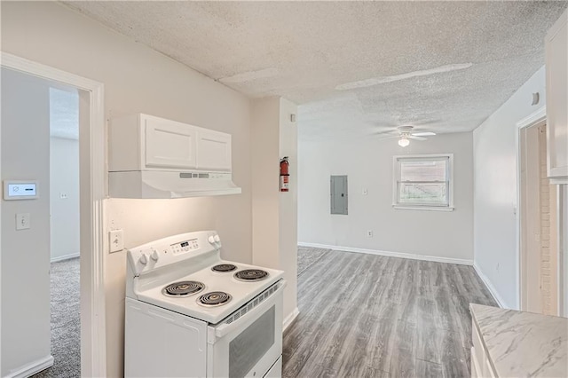 kitchen with white cabinetry, electric range, a textured ceiling, and electric panel