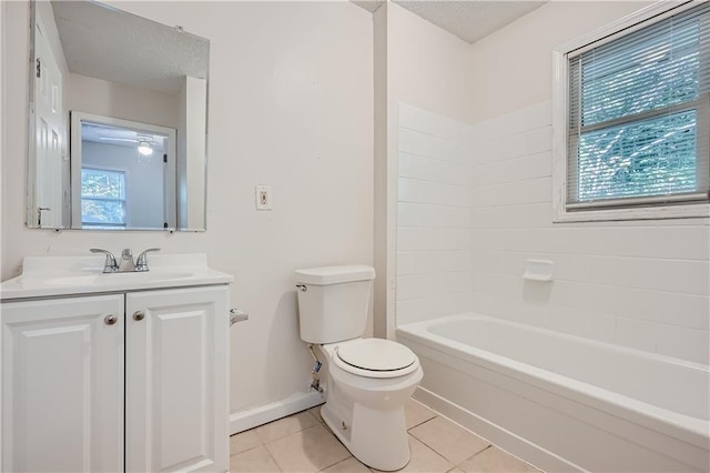 full bathroom featuring vanity, tile patterned floors, toilet, and shower / washtub combination