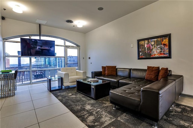 living room featuring visible vents and tile patterned flooring