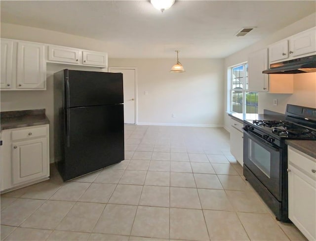 kitchen featuring dark countertops, visible vents, white cabinets, under cabinet range hood, and black appliances