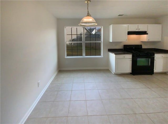 kitchen featuring dark countertops, visible vents, white cabinetry, black range with gas cooktop, and under cabinet range hood