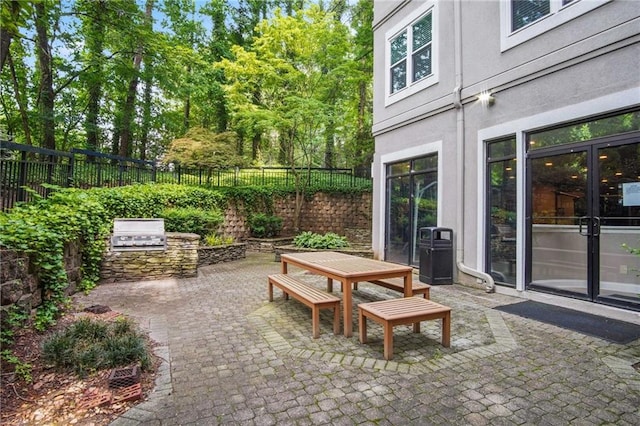 view of patio featuring an outdoor kitchen