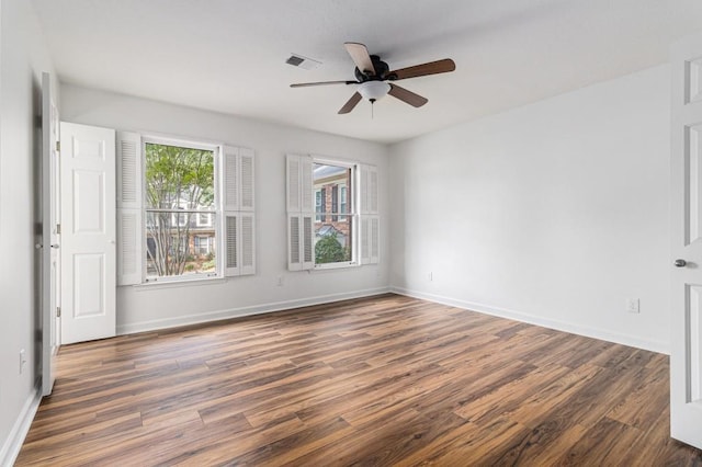 6 Stratford Hall Pl NE, Atlanta, GA 30342 - spare room with wood finished floors, ceiling fan, and baseboards
