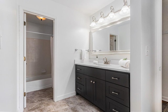 6 Stratford Hall Pl NE, Atlanta, GA 30342 - bathroom featuring vanity, baseboards, and shower / tub combo