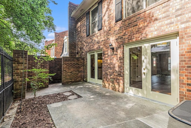 6 Stratford Hall Pl NE, Atlanta, GA 30342 - view of patio / terrace featuring french doors