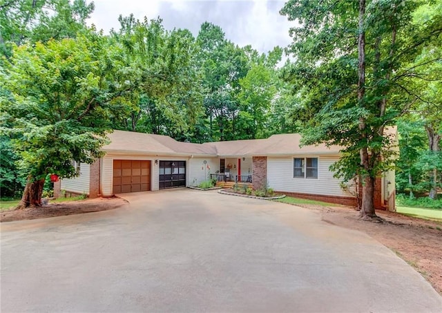 ranch-style home featuring a garage