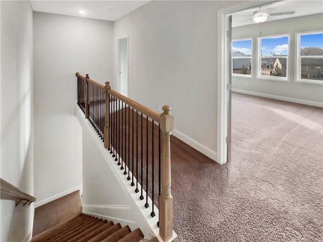 staircase featuring recessed lighting, carpet flooring, and baseboards