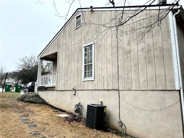 view of home's exterior with central AC unit