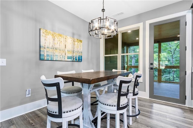 1441 Whitestone Rd, Talking Rock, GA 30175 - dining space featuring a chandelier, wood finished floors, and baseboards