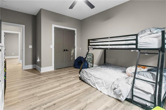 1441 Whitestone Rd, Talking Rock, GA 30175 - bedroom with light wood-style floors, baseboards, ceiling fan, and a closet