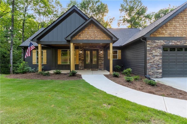 1441 Whitestone Rd, Talking Rock, GA 30175 - craftsman-style house featuring stone siding, a front yard, a garage, and board and batten siding