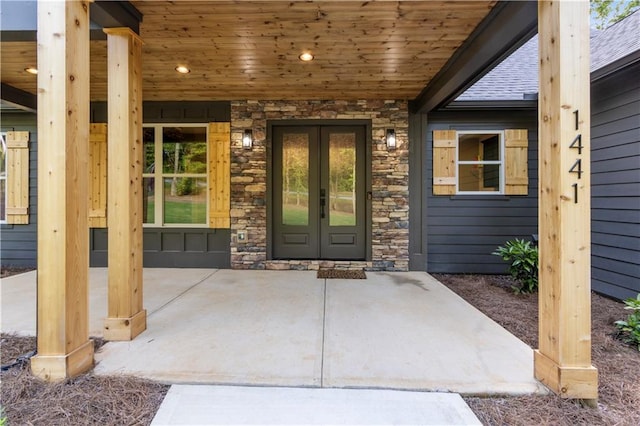 1441 Whitestone Rd, Talking Rock, GA 30175 - entrance to property with french doors, stone siding, and a shingled roof