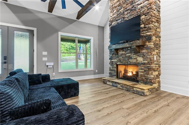 1441 Whitestone Rd, Talking Rock, GA 30175 - living room featuring vaulted ceiling, wood finished floors, baseboards, ceiling fan, and a fireplace
