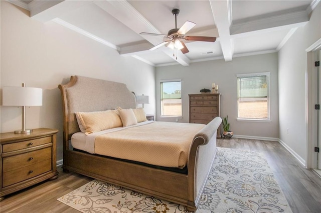 bedroom with light wood-style flooring, ornamental molding, coffered ceiling, beamed ceiling, and baseboards