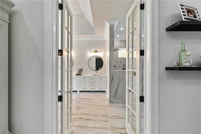 2634 Greenes Ln, Powder Springs, GA 30127 - bathroom with french doors, ornamental molding, marble finish floor, vanity, and recessed lighting