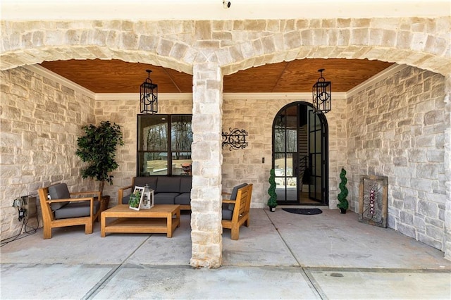 2634 Greenes Ln, Powder Springs, GA 30127 - property entrance with stone siding, a patio area, and outdoor lounge area