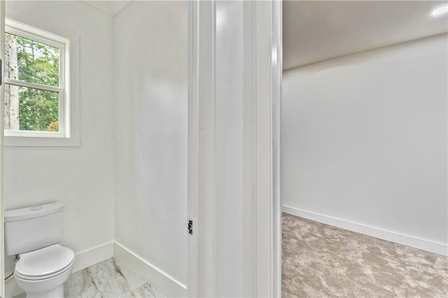 2634 Greenes Ln, Powder Springs, GA 30127 - bathroom with toilet and baseboards