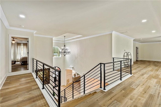 2634 Greenes Ln, Powder Springs, GA 30127 - staircase with baseboards, a chandelier, and wood finished floors