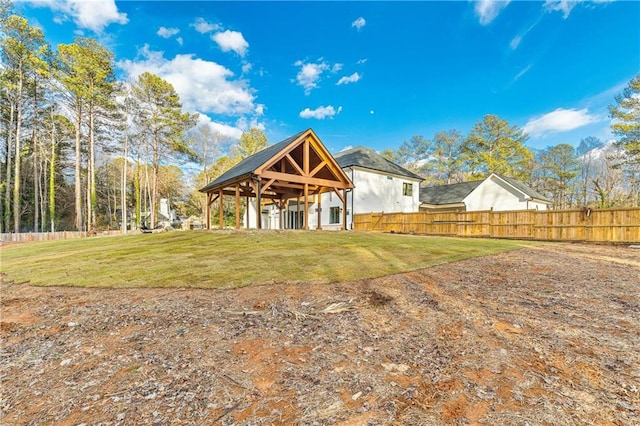 2634 Greenes Ln, Powder Springs, GA 30127 - rear view of property with fence and a lawn