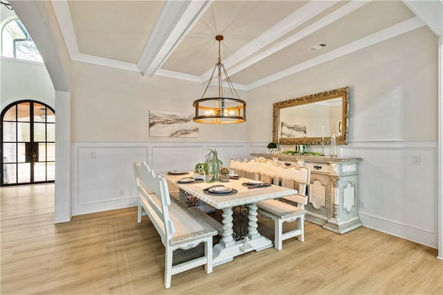 2634 Greenes Ln, Powder Springs, GA 30127 - dining room featuring wainscoting, beamed ceiling, crown molding, french doors, and light wood-style floors