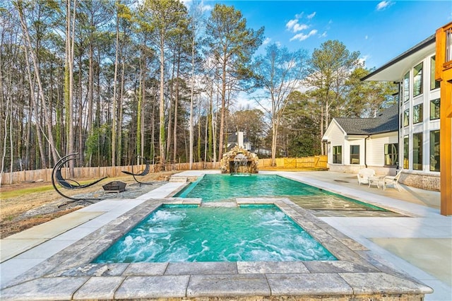 2634 Greenes Ln, Powder Springs, GA 30127 - view of swimming pool with a fenced in pool, a patio area, a fenced backyard, and an in ground hot tub