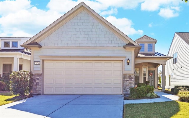 craftsman inspired home featuring a garage