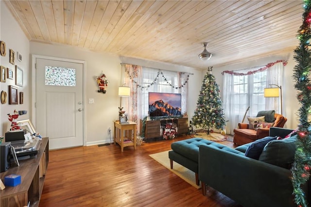 living room featuring hardwood / wood-style flooring and wooden ceiling