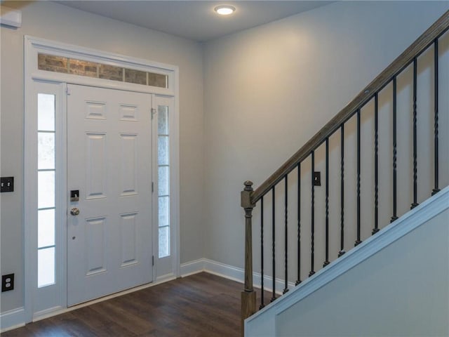 foyer with dark wood-type flooring