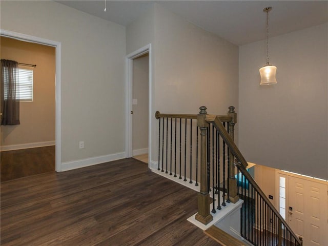 staircase featuring hardwood / wood-style floors