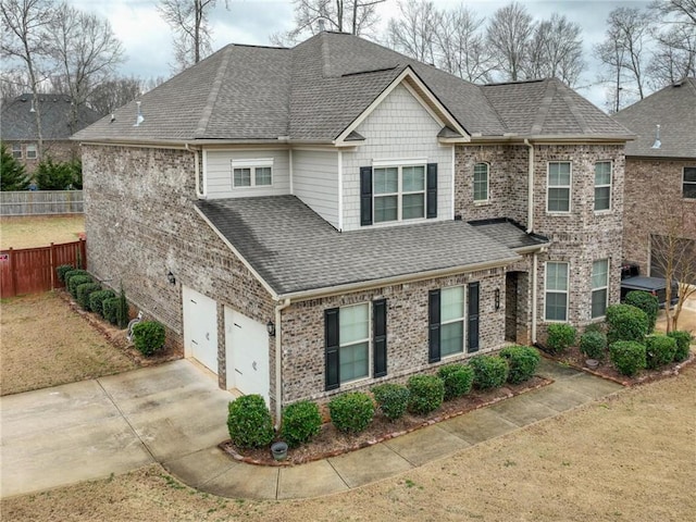 view of front of home featuring a garage and a front lawn