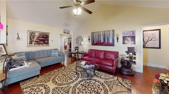 living room featuring dark wood-type flooring, ceiling fan, and high vaulted ceiling