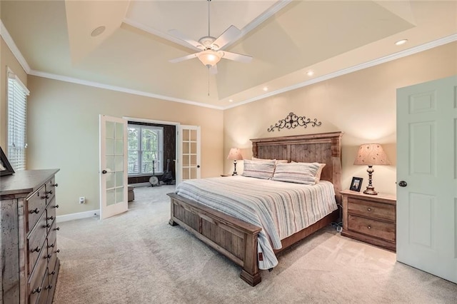 bedroom with crown molding, french doors, a raised ceiling, and light carpet