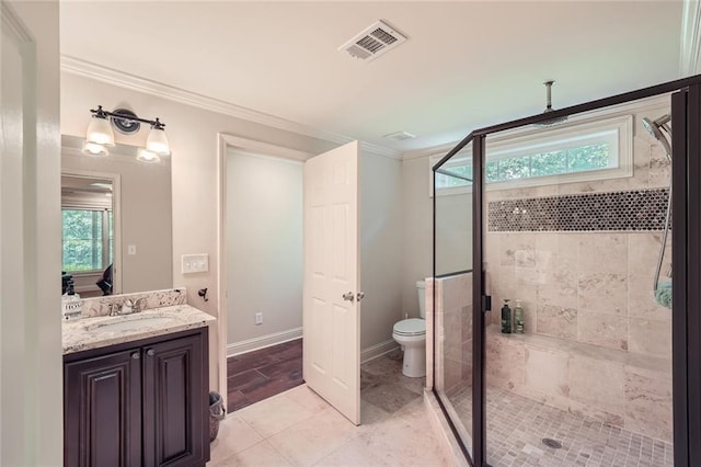 full bathroom with vanity, visible vents, a stall shower, ornamental molding, and toilet