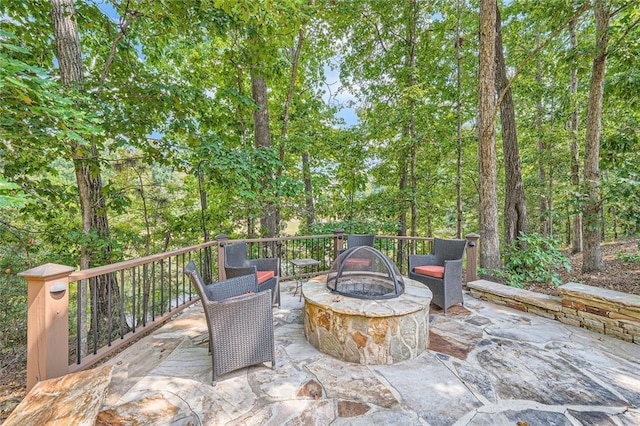 view of patio featuring an outdoor fire pit