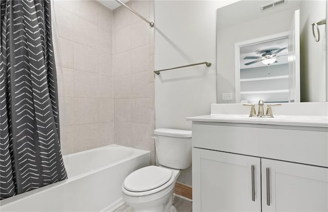 full bathroom featuring ceiling fan, toilet, vanity, and shower / bath combo