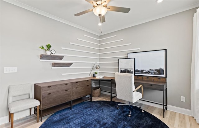 home office with ceiling fan, wood-type flooring, and crown molding